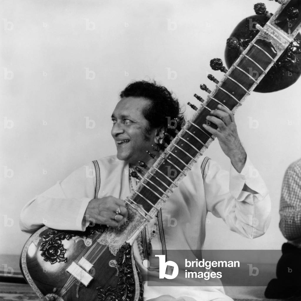 Ravi Shankar (n1920) Indian musician playing the sitar in 1983
