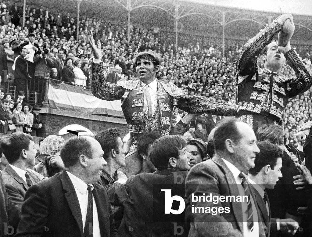 Spanish toreador Manuel Benitez called El Cordobes during bullfight in Castellano de la playa Spain March 11, 1967 on the right Diego Puertas