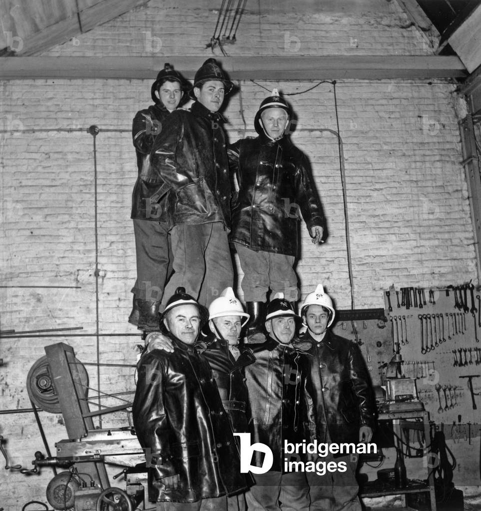 The Delnatte family of Mouscron (Belgium) has been a small fire brigade for four generations here the four Delnatte brothers and their three sons on 31 January 1955.