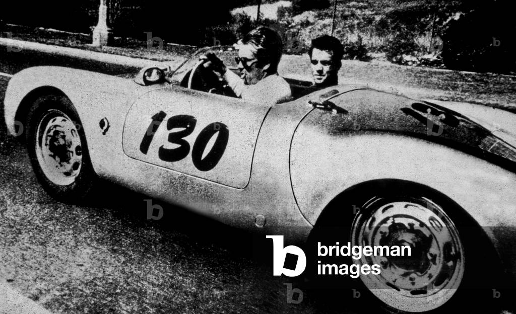 James Dean with Rolf Wutherlich, in his Porsche Spider 550A , 1955 (b/w photo)