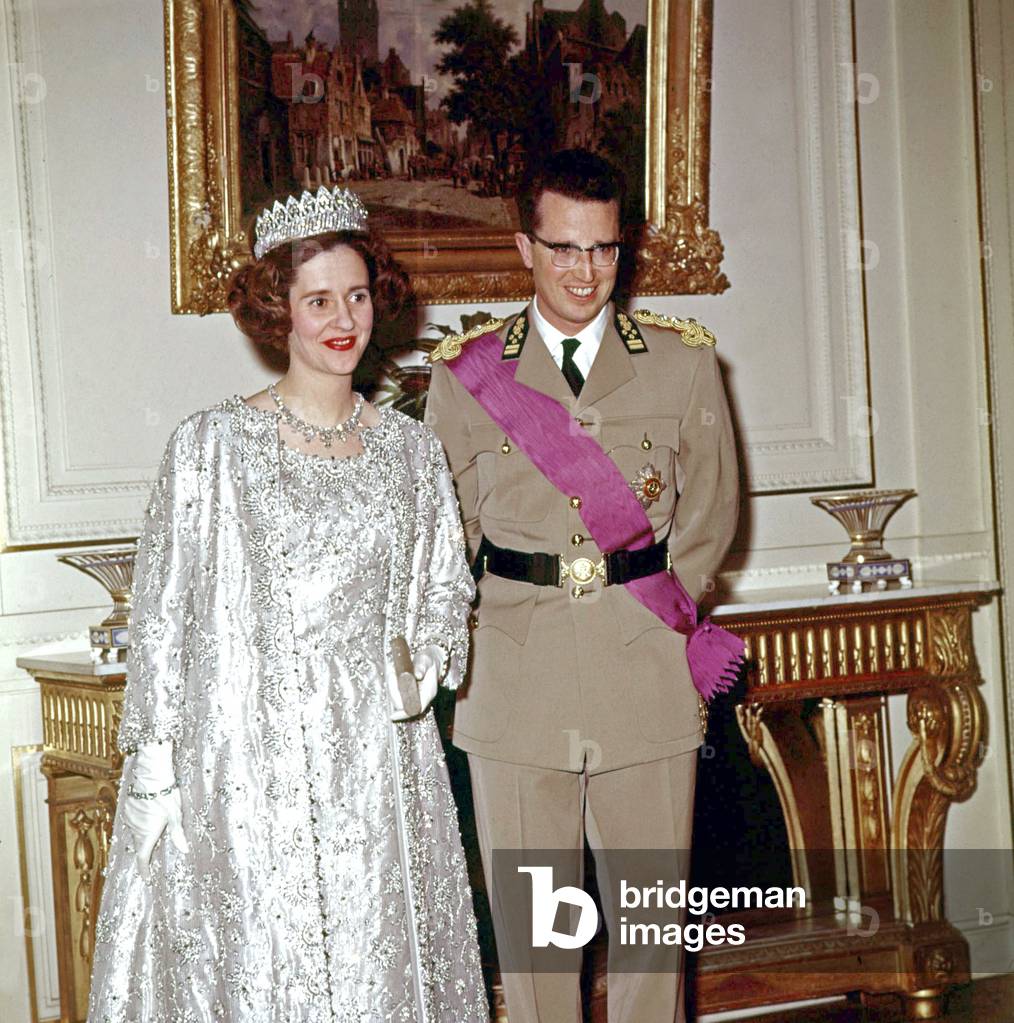 The royal couple of Belgium, the Queen Fabiola, born Dona Fabiola of Mora y Aragon and the King  Baudoin Ist, during a reception on December 17th, 1963