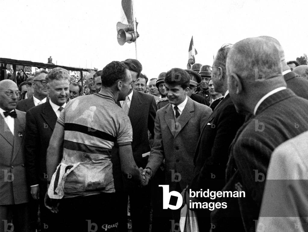 Belgian cyclist Rik Van Steenbergen congratulated by prince Alexander of Belgium on August 18, 1957 in Waregem
