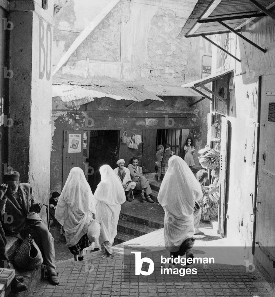 Women walking in the streets of Algiers October 25, 1957 during the war