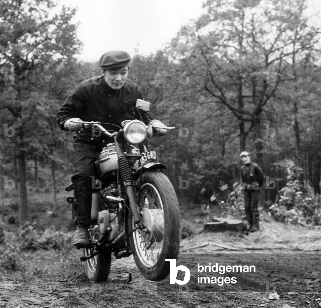 French Singer Ricet Barrier (Maurice-Pierre Barrier) on a moto April 1965