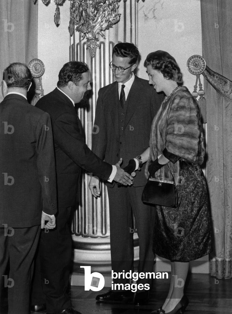 Alain Bombard with King  Baudouin 1st and Queen Fabiola of Belgium during a reception at royal palace in Brussels on September 27, 1961