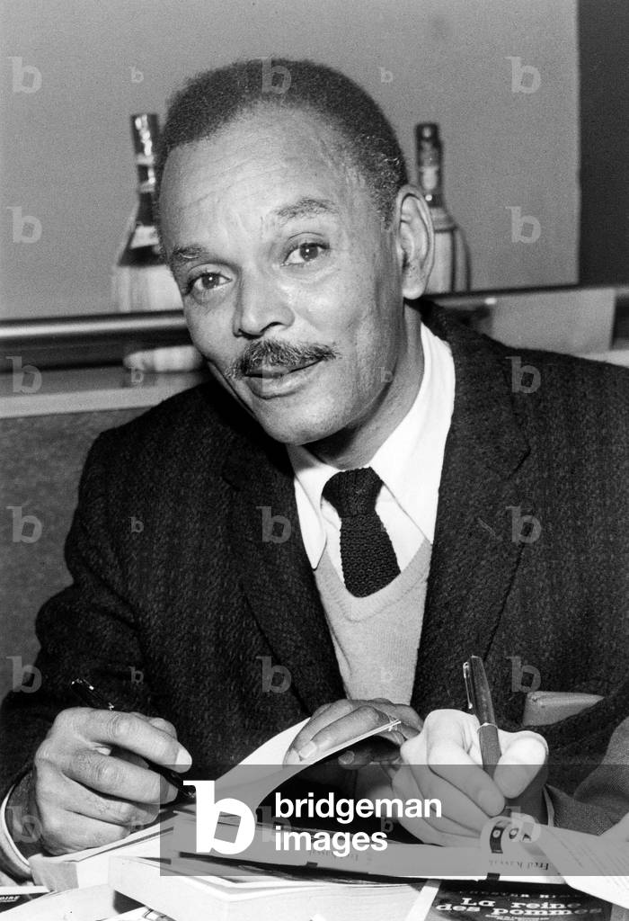 Chester Himes (1909-1984) American novelist receiving literature prize for his book La Reine des Pommes November 1st, 1958