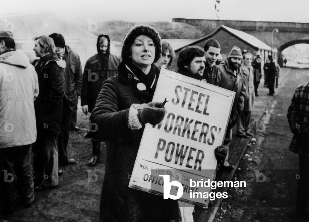 Greve at the Corby steel mill here the strike picket Mrs. Karen Locker nicknamed the “Bionic Tea Cosy” (because of her wool cap) here in action in Grantham, Lincolnshire on January 16, 1980