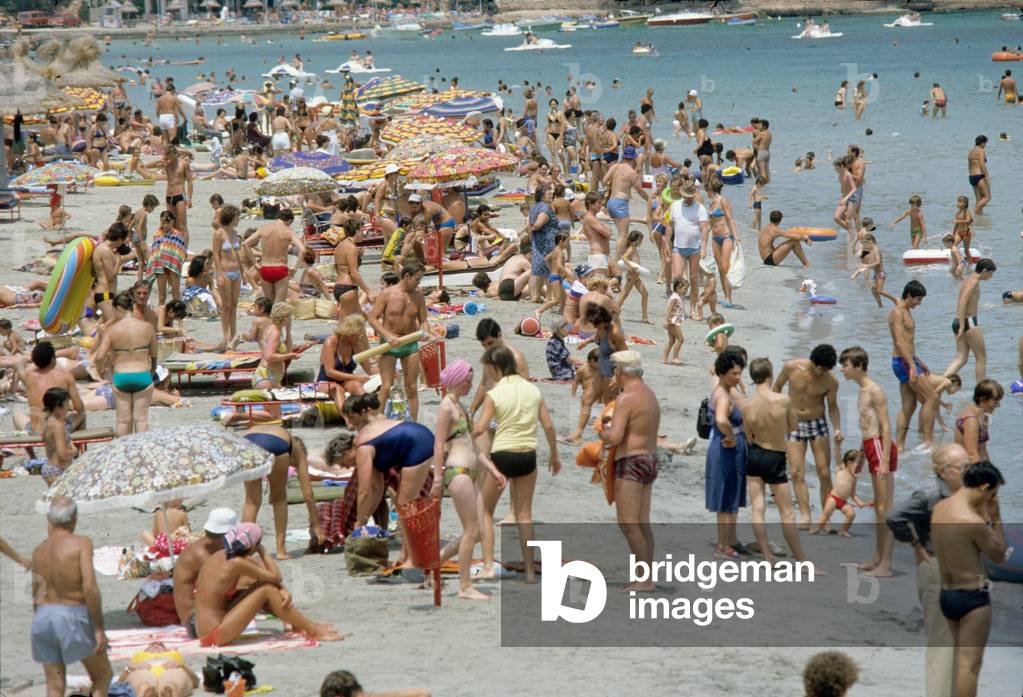 The crowd on the beach in Palma Nova, Majorca, Balearic (Spain) July 1978