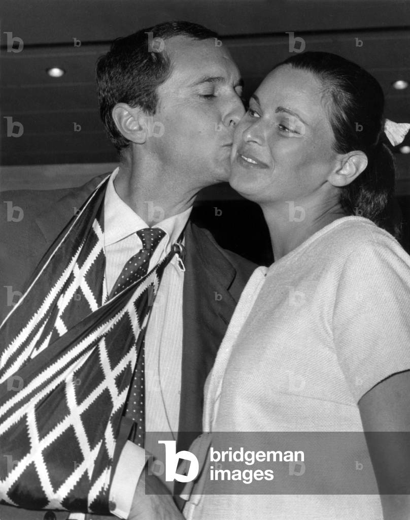 Spanish toreador Luis Miguel Dominguin and his wife Actress Lucia Bose at Barajas airport in Spain to go in London for surgery of arm, August 1962