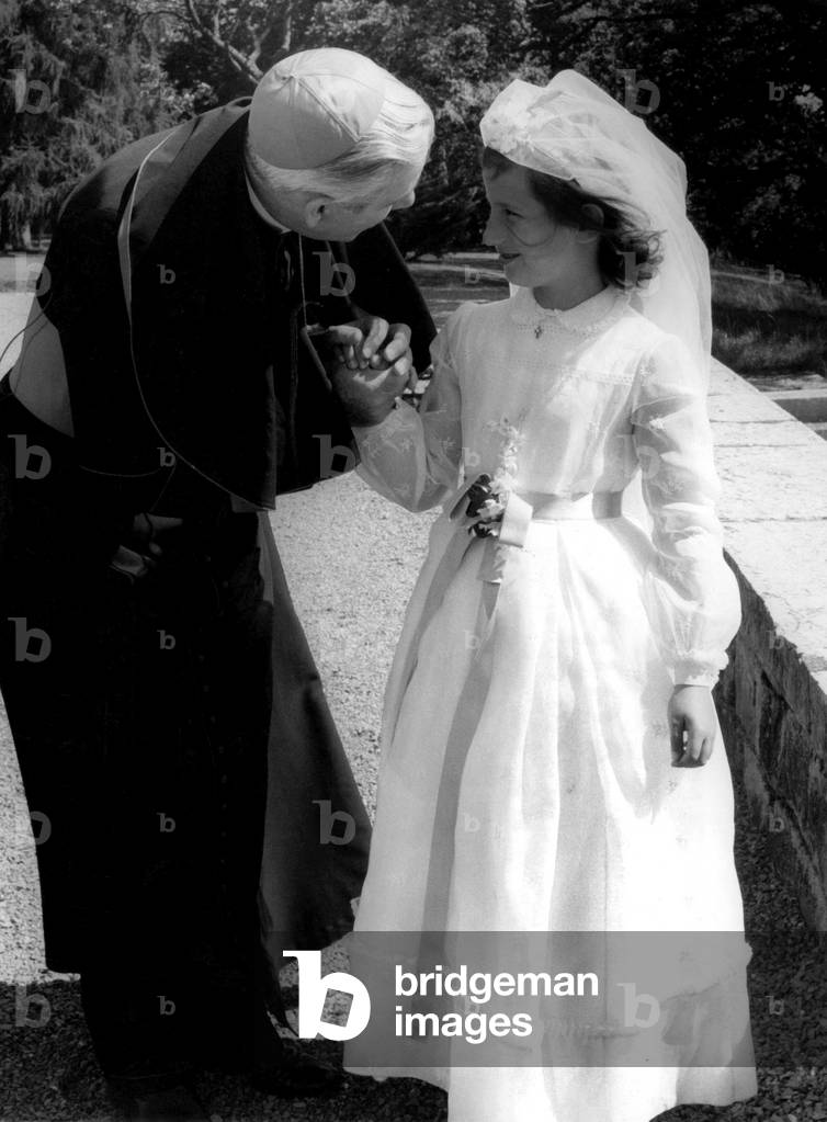 first communion of Princess Marie-Esmeralda of Belgium (daughter LeopoldIII of Belgium and Liliane-of-Rethy, and half-sister of Baudouin1st, born in 1956) at the Chevetogue abbey in August 1964 here with bishop Fulton Sheen