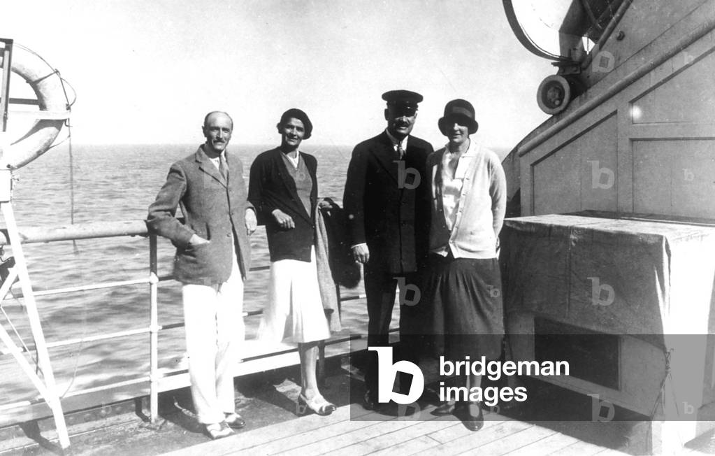 Christian Lazard (left) with Antoinette Fould (2nd left) and her parents shipwright Rene Fould (2nd right) and Esther Fould godmother of the ship (right) on deck of transatlantic liner Ile de France (built in 1927) September 18, 1929 during maiden crossing LeHavre-NewYork
