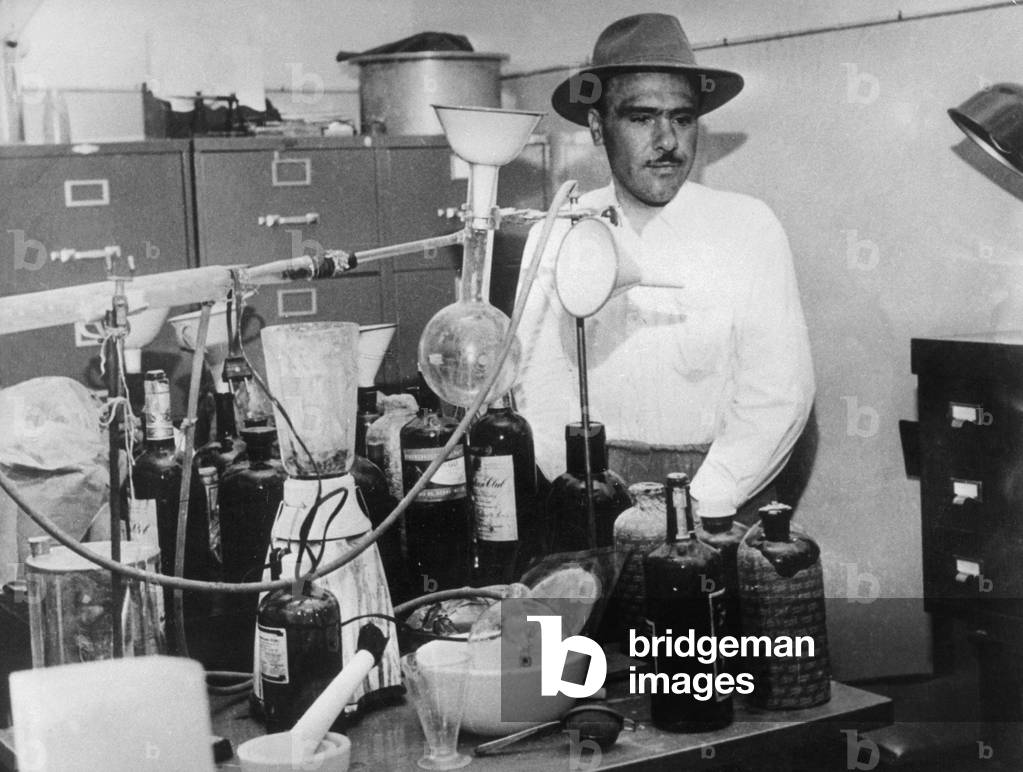 Laboratory of drugs dealers in Teheran, Iran, discovered by policemen May 14, 1961