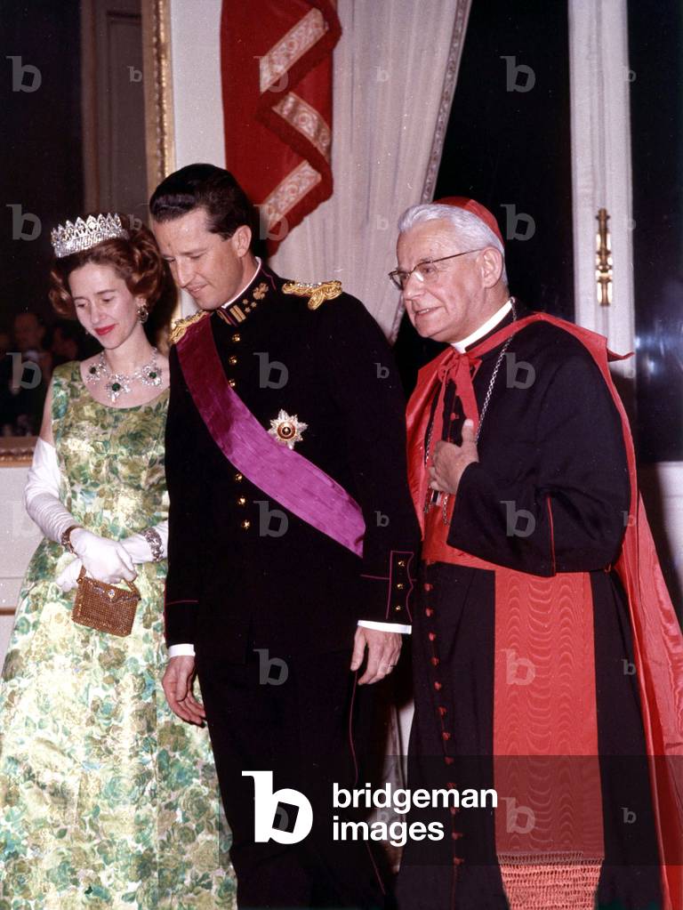 King Baudouin 1st of Belgium and Queen Fabiola on January 31, 1967 during reception at Brussels royal palace with cardinal Alfrink Bernardus Johannes