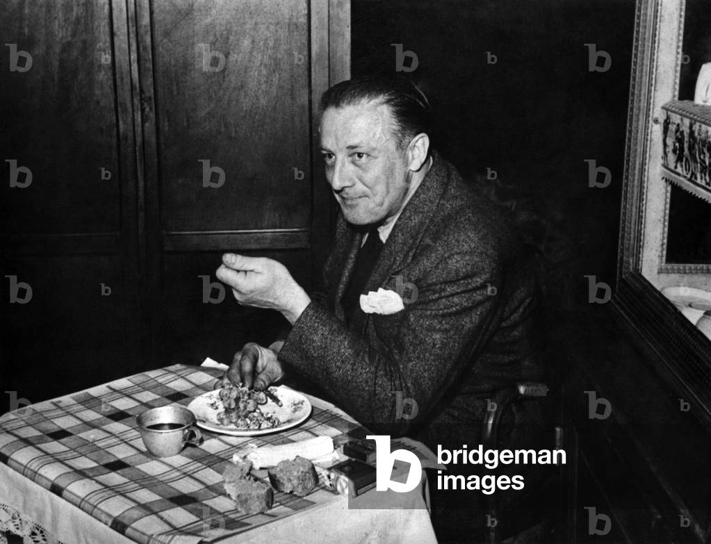 The hit man Abel Danos says the Mammoth, Member of the Middle and Carlingue in 1941-1944, here at table while he is a prisoner. 1948.