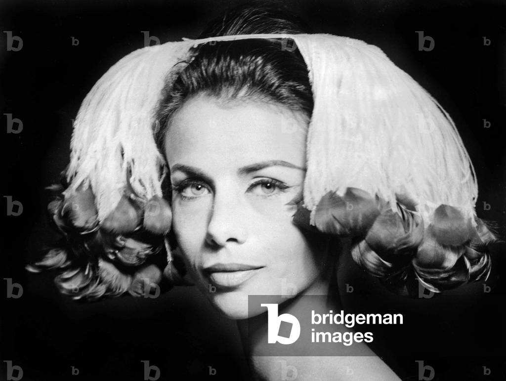 infanta - style ostrich feathers hairstyle or headgear with purple pendants December 12, 1963