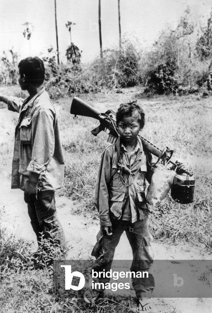 A child soldier in the army of marshal Lon Nol, Cambodia, March 1975 (b/w photo)