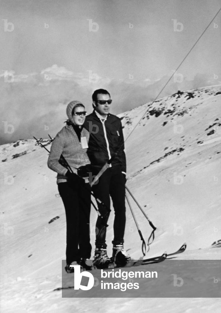 Prince Alphonso de Bourdon and his fiancee Maria Carmen, Franco's little daughter, in winter sport. December 31, 1971