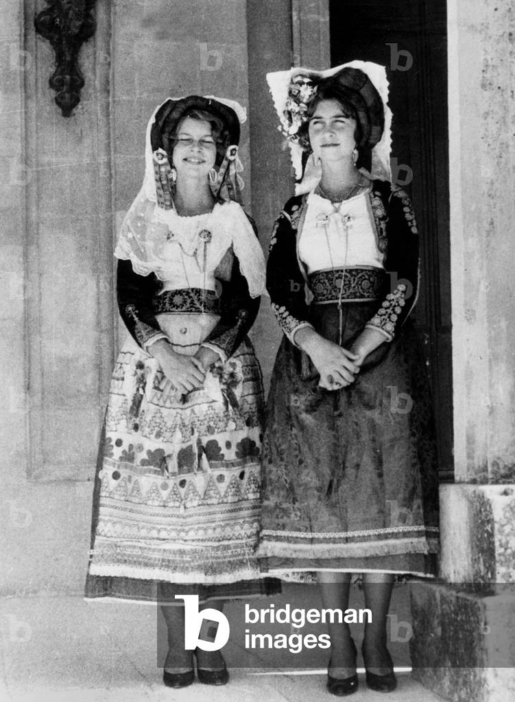 Princess Irene and Princess Sophia of Greece wearing traditional greek suit, August 1960