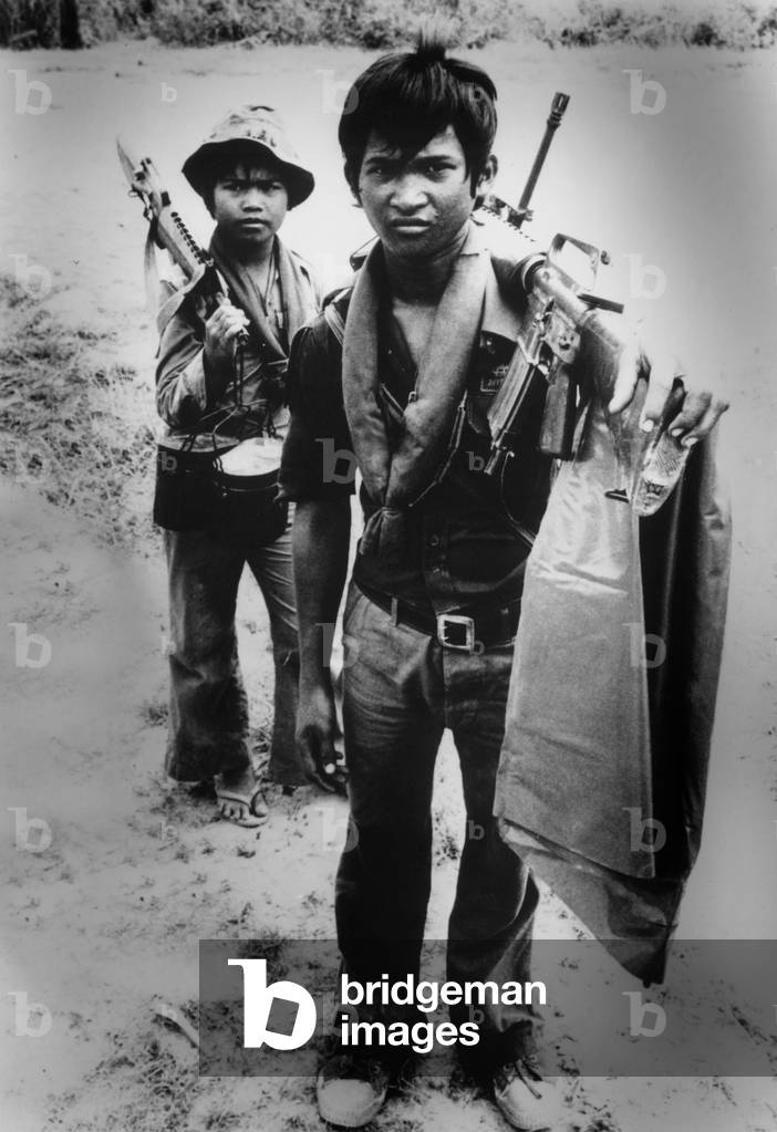 Cambodian child enlisted as a soldier in Lon Nol troops in March 1975 before capture of Phnom Penh by Red Khmers