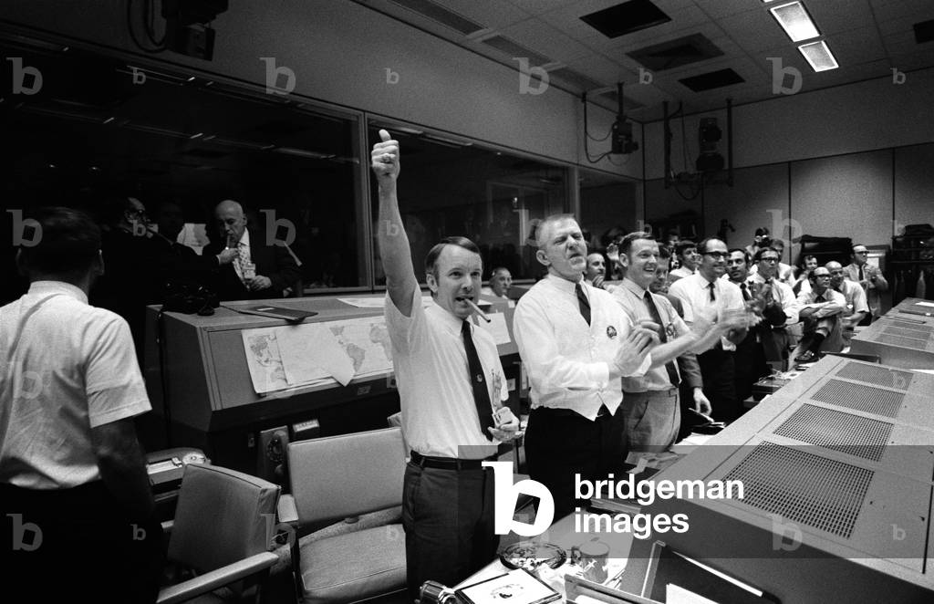 Johnson Space Center, April 17, 1970 : Three of the four Apollo 13 Flight Directors applaud the successful splashdown of the Command Module 
