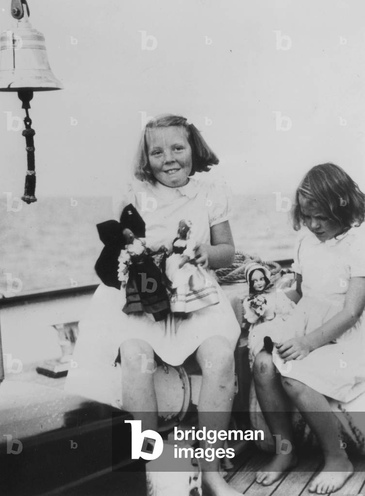 Princess Beatrix of the Netherlands (l, daughter of queenJuliana and prince BernhardofHolland, future queen) with her cousin Princess Irene of Holland, on the royal yacht 