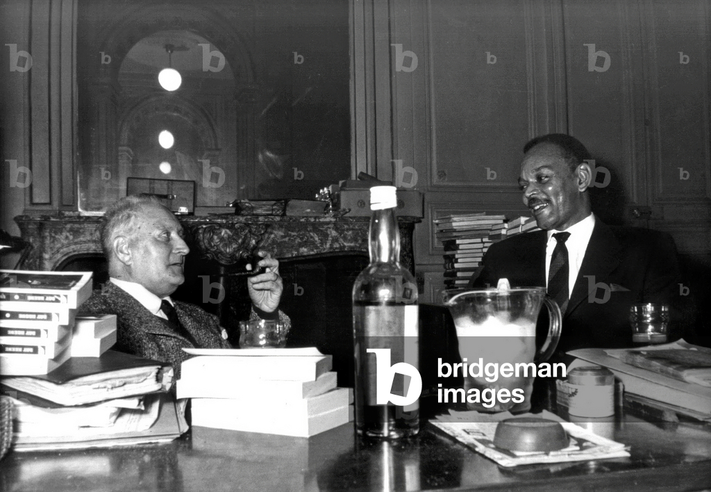 Writers Jean Giono (1895-1970) and Chester Himes (1909-1984) in Paris in 1958
