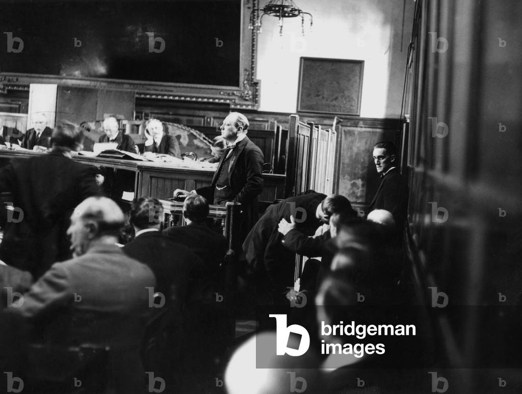 Winston Churchill (1874-1965) in witness box at Tank Inquiry Lincoln's Inn Court during trial