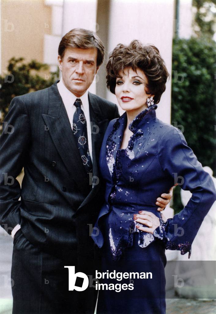 Joan Collins and Jeroen Krabbe in the TV series “Dynasty”, on the set of Carrington Manor, Pasadena, USA, July 1991