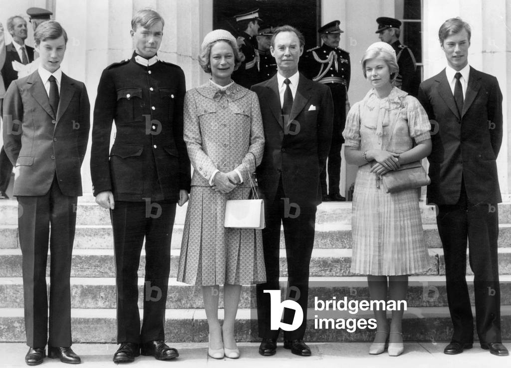 In the centre : Grand Duchess Josephine Charlotte (born Princess of Belgium) and Grand Duke John of Luxemburg with their children (l-r) : prince William, prince John, Princess Marie Astrid and prince Henri of Luxemburg (future Grand Duke) during the parade of the military academy of Sanhurst (England) where prince Jean is student, on August 8, 1977