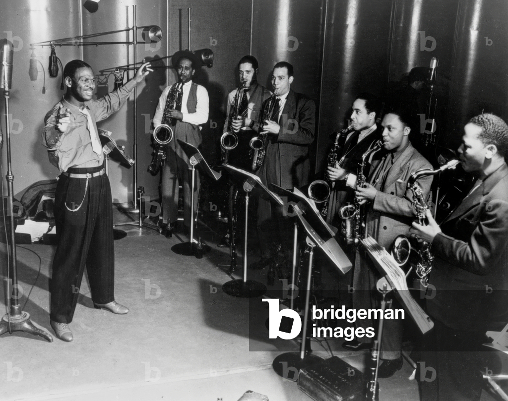 Earl Hines and his jazzband during a repetition in studio in the 40's