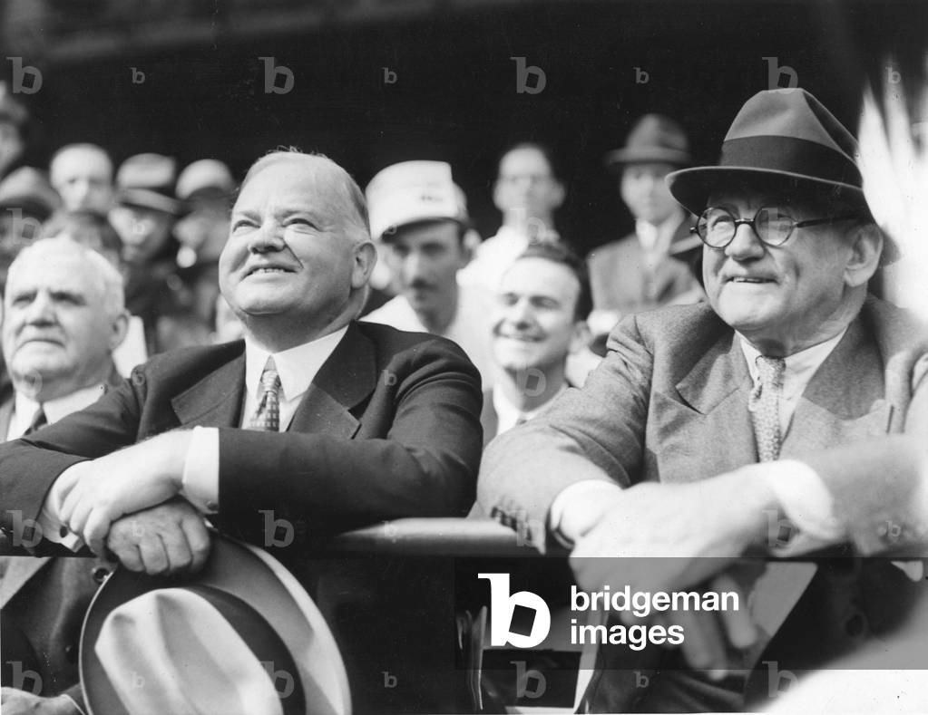 Herbert Hoover (l, 1874-1964) American President in 1929-1933 here at baseball match in 1936