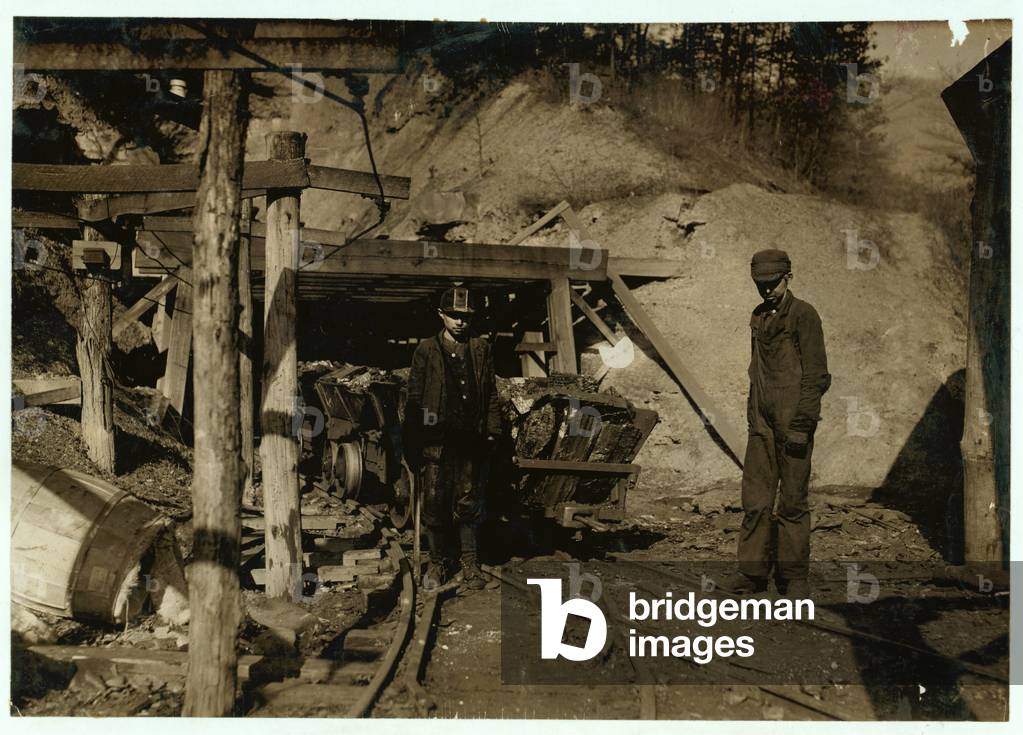 Hard work and dangerous for such a young boy. 1908 (photo)