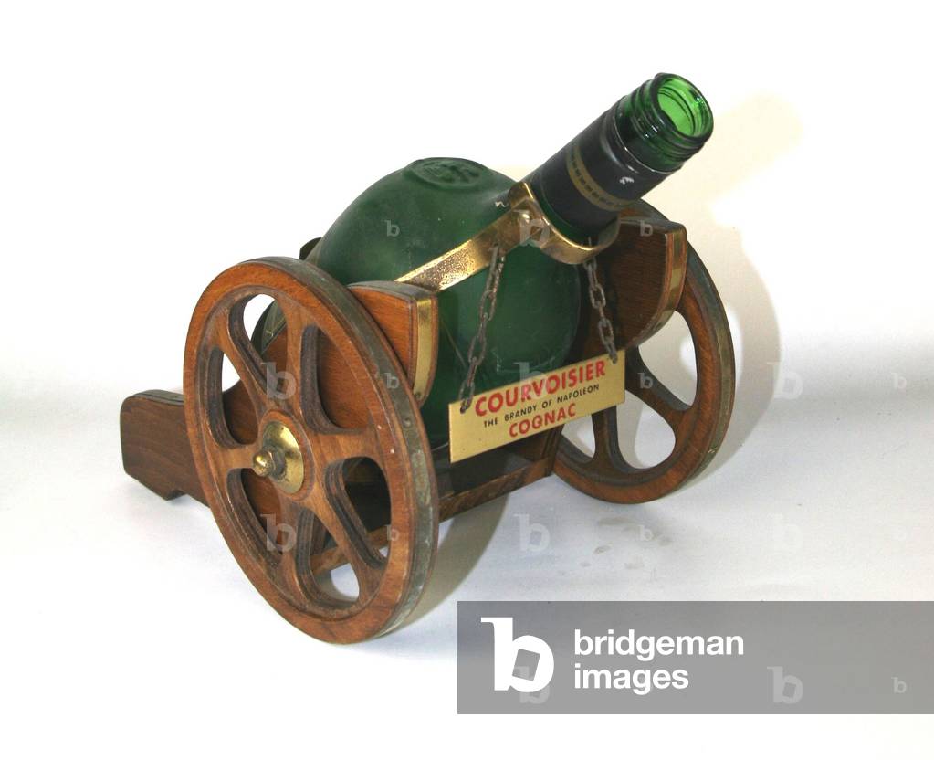 Image of Photography depicting Courvoisier cognac bottle display in the shape of a cannon around 1965 1965