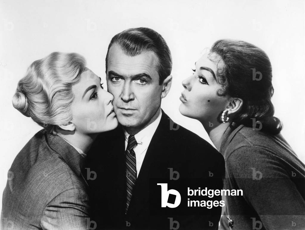 Kim Novak, James Stewart and Kim Novak in a publicity photo for Hitchcock's Vertigo (1958 Kim Novak, James Stewart and Kim Novak in a publicity photo for Hitchcock's Vertigo (1958