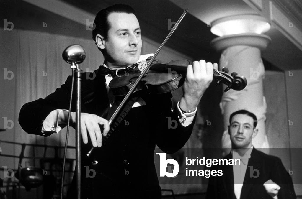Stephane Grappelli playing violin on stage c. 1937 (b/w photo) by Unknown photographer, (20th