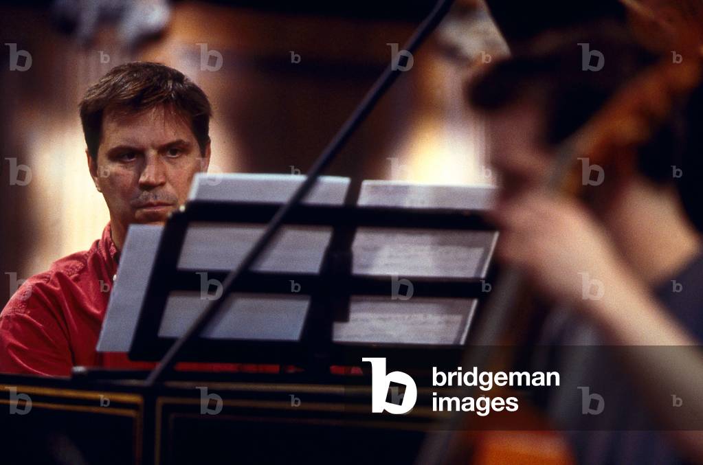 Image of Photography depicting Skip Sempé playing the harpsichord by Thierry Martinot