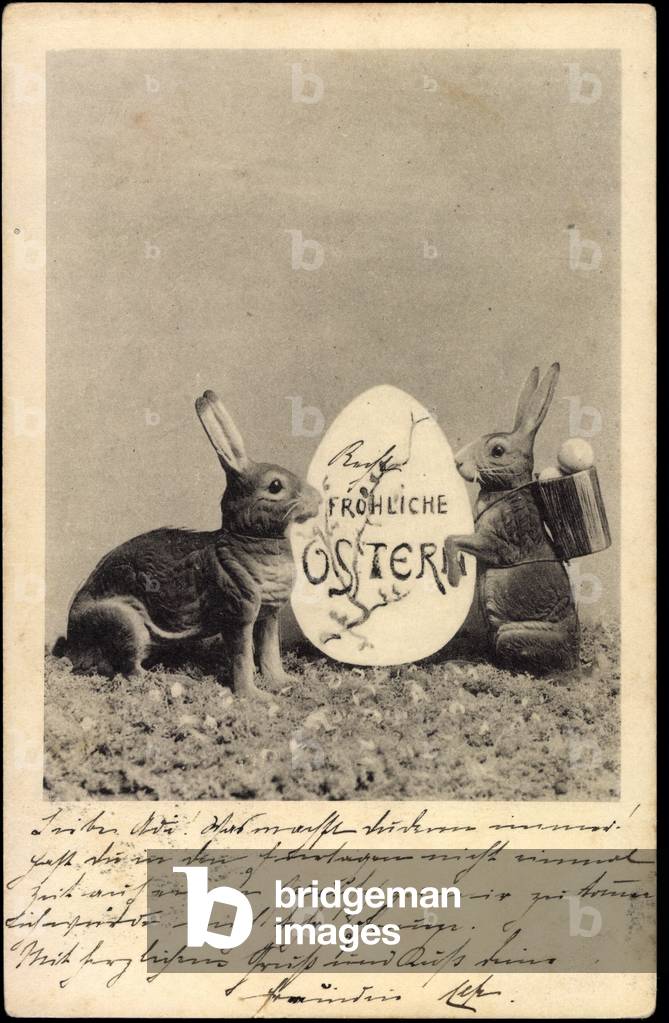 Frohe Ostern, Osterhasen mit Korb auf der Wiese, Ei