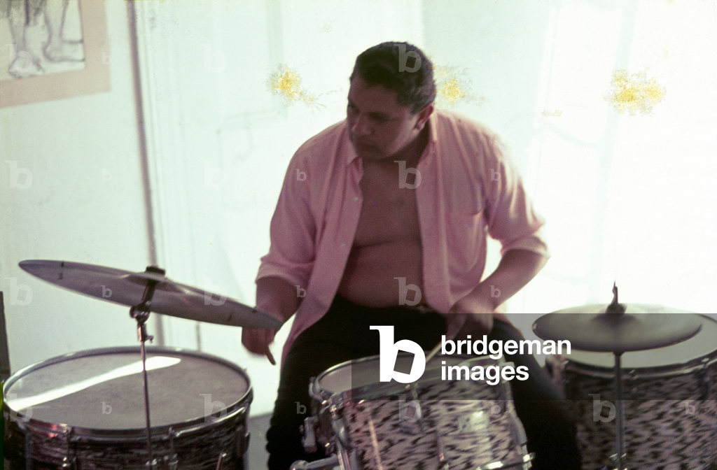 Colour photo of Monty Weber playing the drums at The Art Centre, Green Point, Cape Town, 1972 (photo)