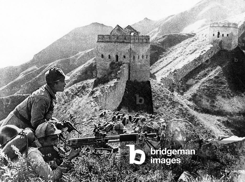 Image of Japanese invading China in 1939 snipers at great wall