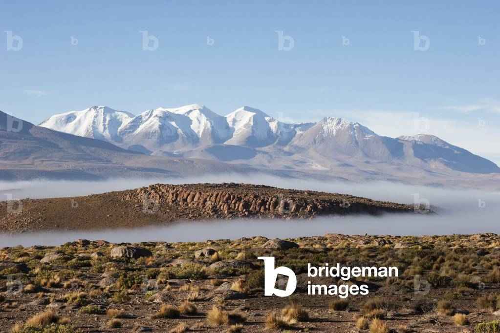 Image of Photography depicting Aucanquilcha Volcano & Salar De Alconcha Salt Pan Covered By Fog (photo) 2008