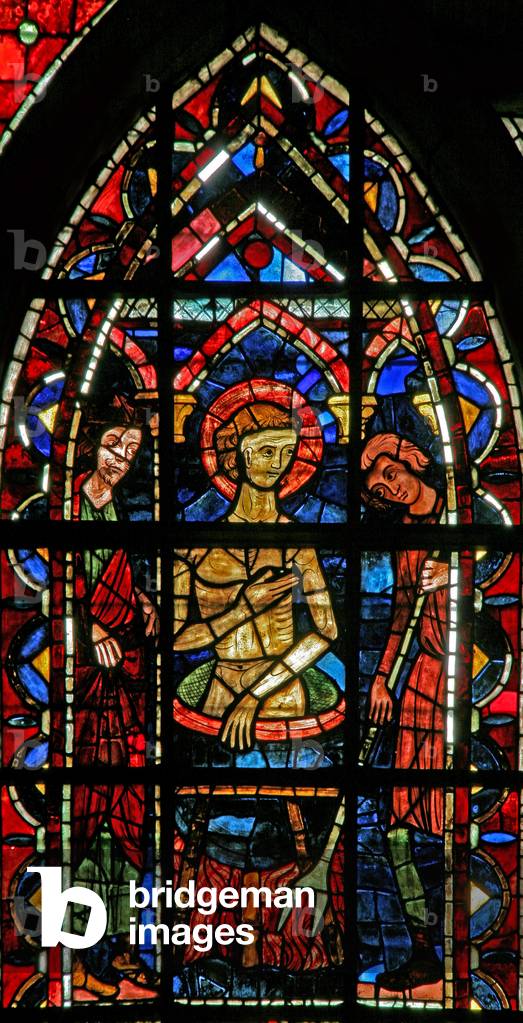 Window w202 depicting a scene from the legend of St John: the saint in a cauldron of boiling oil (stained glas