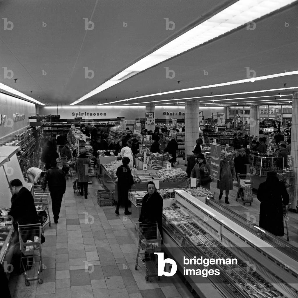 Image of Customers at the frozen food department of a supermarket at