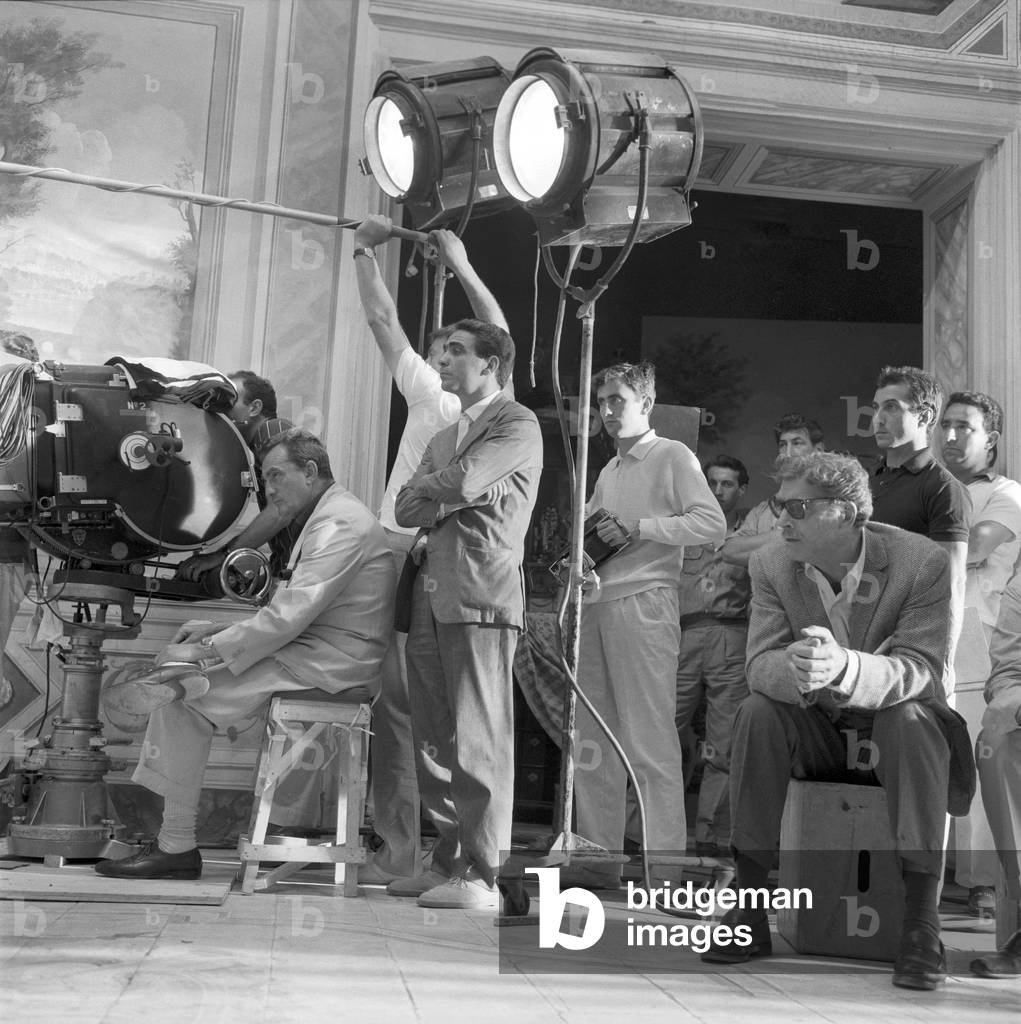 Italian director and scenarist Luchino Visconti on the set of the film 'The Leopard', Italy, 1962 (b/w photo)