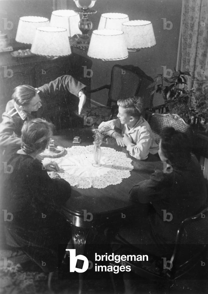 Image of A soldier on leave tells his wartime experiences, 1941 (b/w