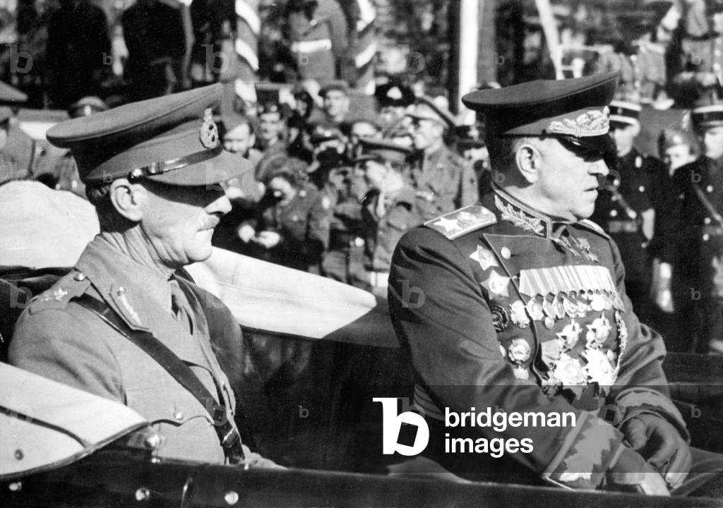 Marshal Joukov, commandant of occupation forces in Berlin, reViewing troops with General Neres commandant of b