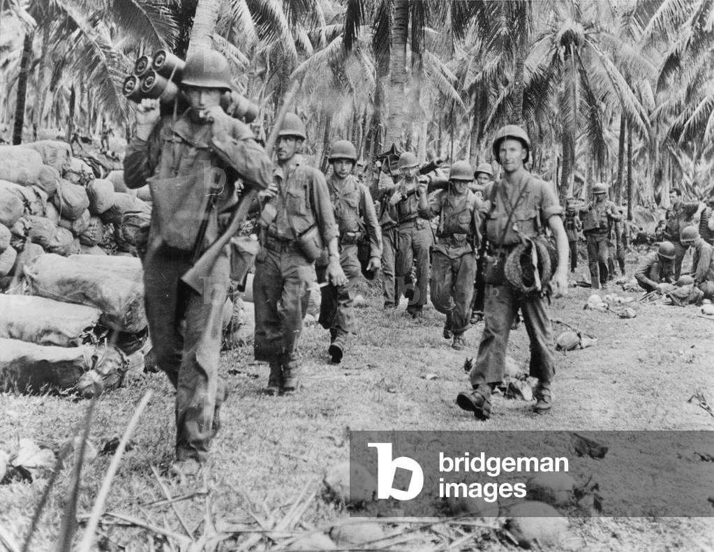 WWII JUNGLE WARFARE U.S. Army troops and Marines marching ashore on