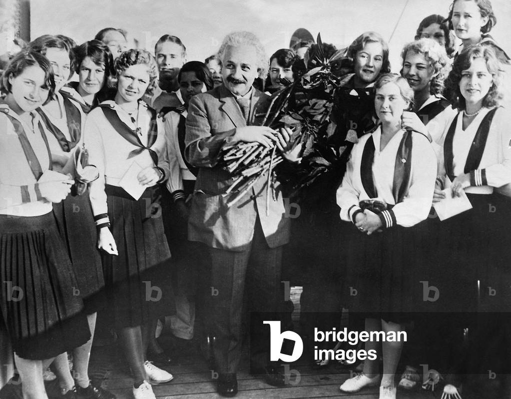 Image Of Albert Einstein Greeted With Flowers By Students Of The San