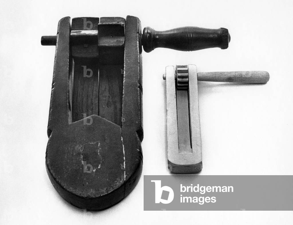 Image of Photography depicting Two medieval rattles by Godfrey Macdominic, b/w
