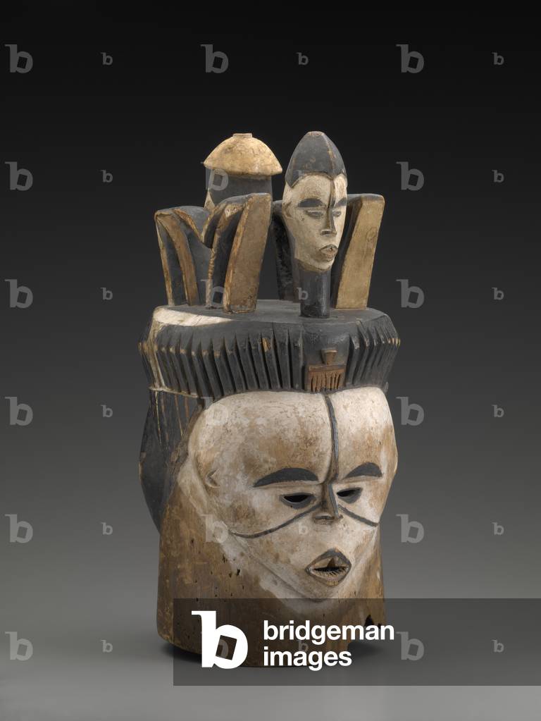 Janus-Faced Helmet Mask With Two Human Head Finials (photo) by African Artist