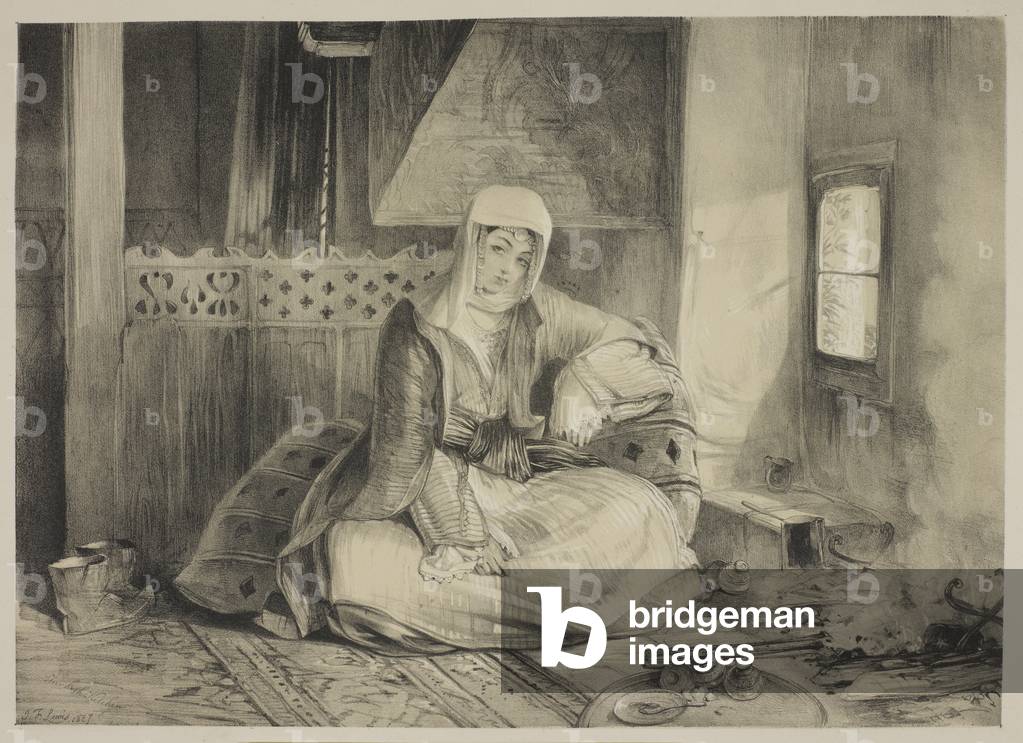 Una giovane donna dentro una stanza.